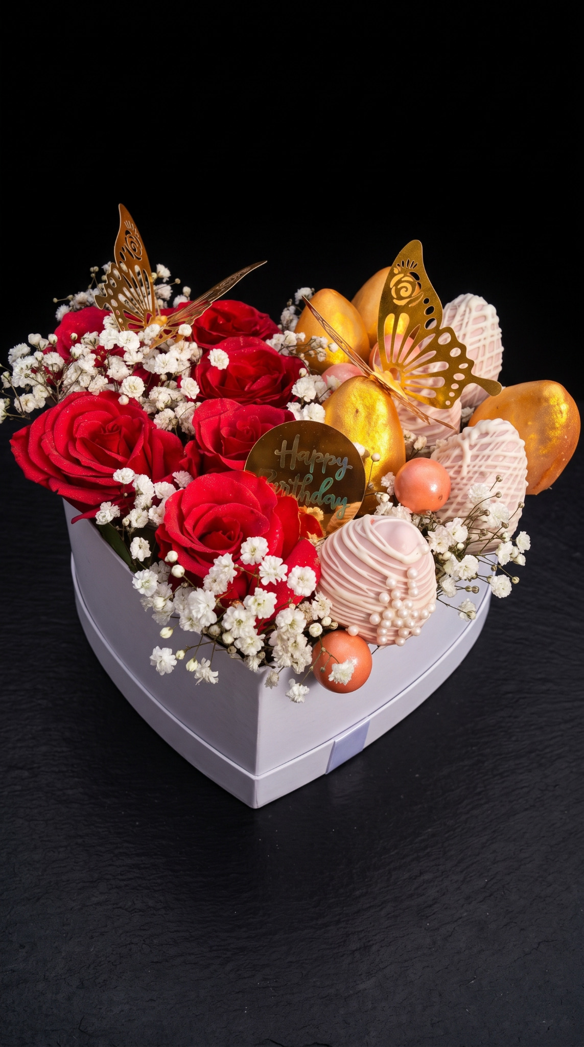 A decorative arrangement of fruit and treats